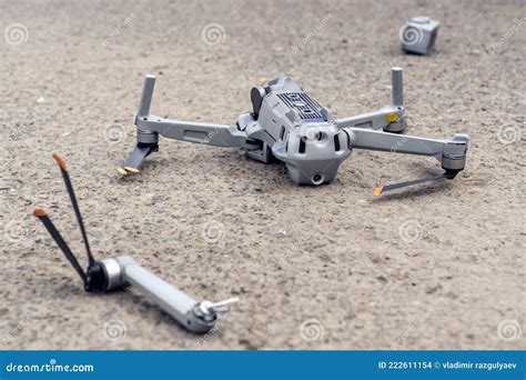 fall   drone  broken flying quadcopter  lying   asphalt  propeller