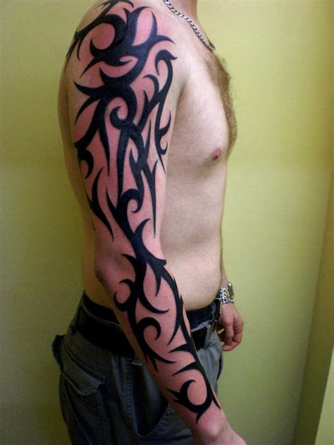 groovy tribal arm tattoos slodive
