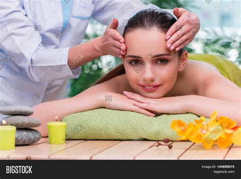 young woman  massage session stock photo stock images bigstock