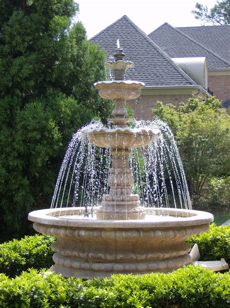 photo fountain  garden fountain garden plants