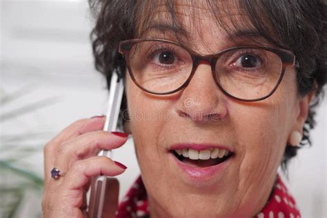 Portrait Of Mature Brunette Woman Talking On Phone Stock Image Image