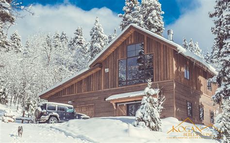 front exterior  lakeside colorado mountain cabin  winter snow designed  built  kogan