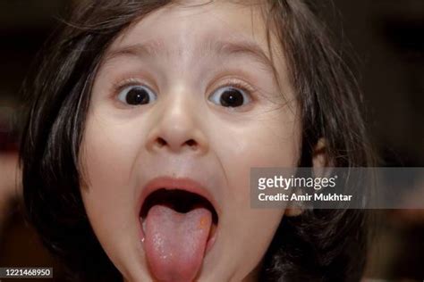 girl mouth open tongue out photos et images de collection getty images