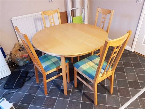 ikea  beech extending dining table  aaron chairs multi colour
