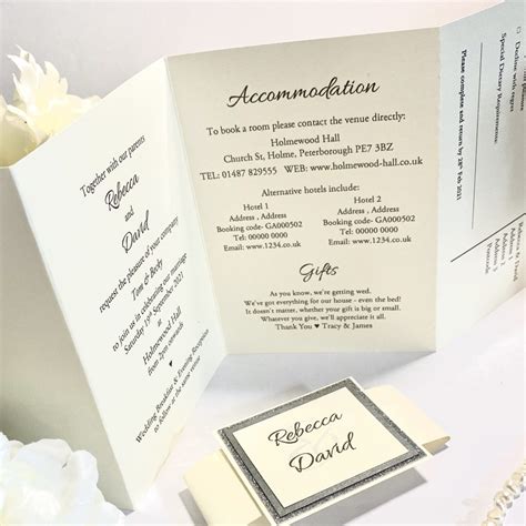 concertina folded invitation with belly band and plaque i do designs