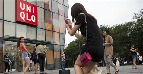 beijing police detain at least 4 over uniqlo sex video