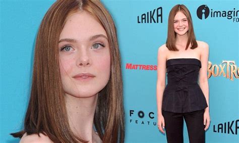 elle fanning debuts new brunette locks at los angeles premiere for new film the boxtrolls