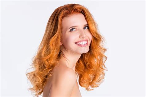 side profile photo portrait of girl with curly red hair laughing happy