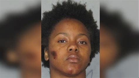 woman accused of beating victim with bat attacking officer