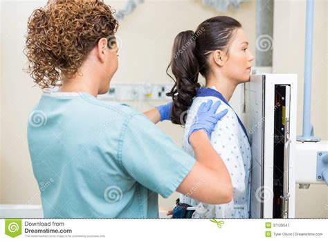 nurse preparing patient for chest xray stock image image of care