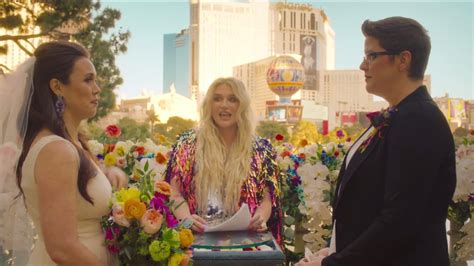 kesha officiates a real life lesbian wedding in her new music video