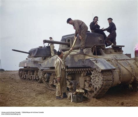 Tankers Replenish The Ammo In A Canadian Ram Cruiser Tank