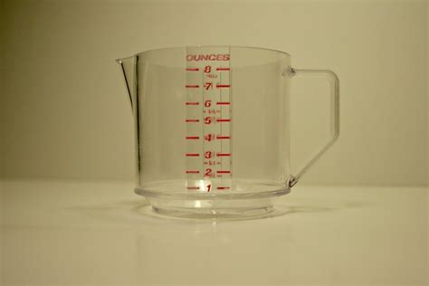 measuring cup plastic measuring cup feel    thi flickr