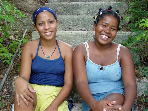 teenage girls on steps santiago de cuba cuba adam