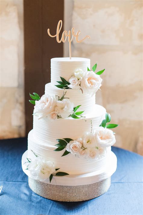 Simple White Wedding Cake With Flowers