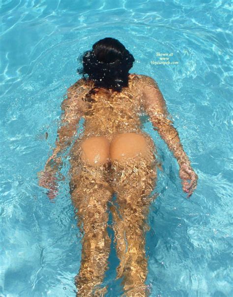 nude girl swimming in pool butt floating july 2007