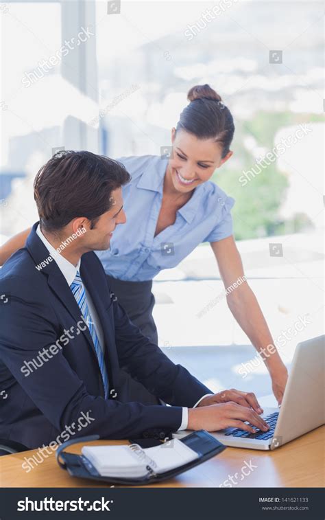 happy business people working  laptop stock photo