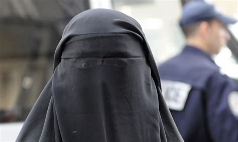 Culture Shock Woman In Black Niqab At Grocery Store Democratic