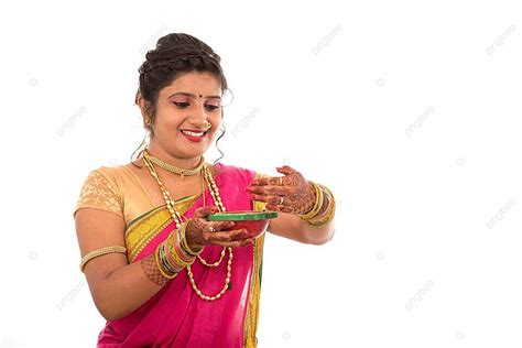 Traditional Indian Girl Holding Pooja Thali And Diya During Diwali