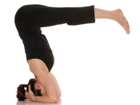 standing   head     yogic pose  yoga posture  called shirshasana