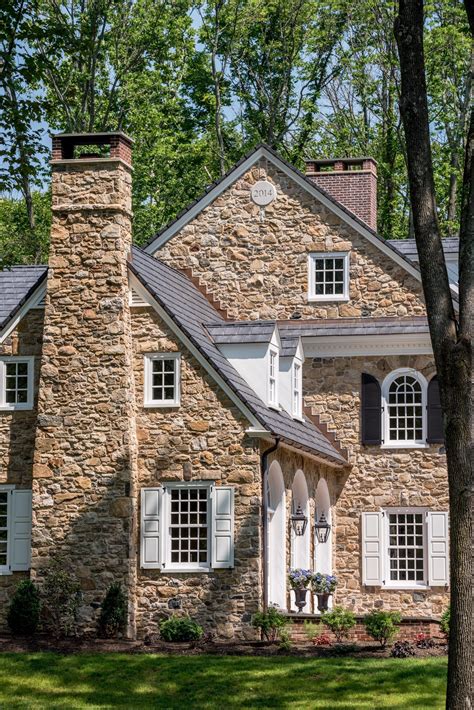 colonial revival stone farmhouse  arch top window details  horsham pa stonedesign