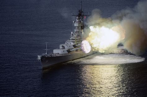 perfectly timed photo   battleship uss wisconsin firing