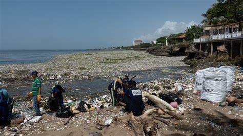 absolutely shocking waves of garbage hit dominican republic beach