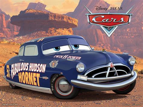 character cars  disney pixar  shown  front  mountains