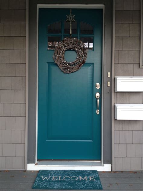 teal front door  gray shutters   brick house  lovely exterior house colors house
