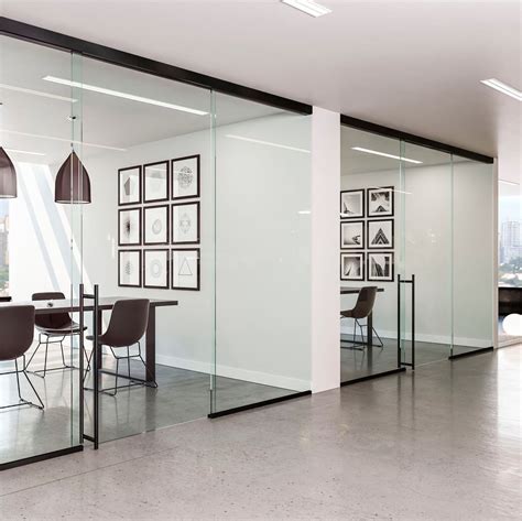 Promoting Employee Interaction 4 Reasons Why Frameless Glass Wall