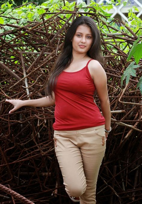 kanika tiwari hot spicy red top photos tamil actress saree below