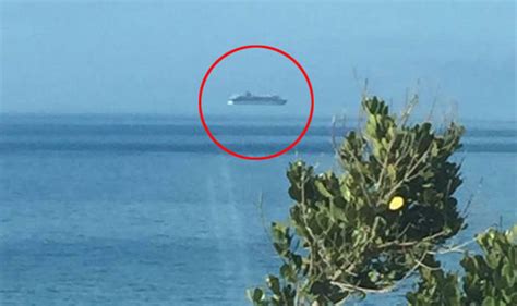 Cruise Ship Floats In The Sky Above Water In Bizarre