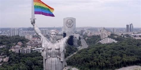 lgbt activists put rainbow flag in hand of famous ukrainian motherland