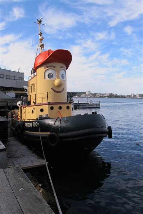happy tugboat in halifax harbor probably named tommy the tug tug