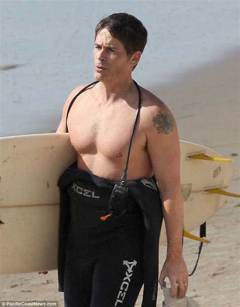 shirtless rob lowe flaunts his muscular body at 48 on early morning