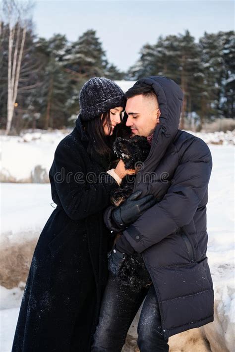 Young Sensual Couple In Love Embracing Outdoor In Winter Park Stock