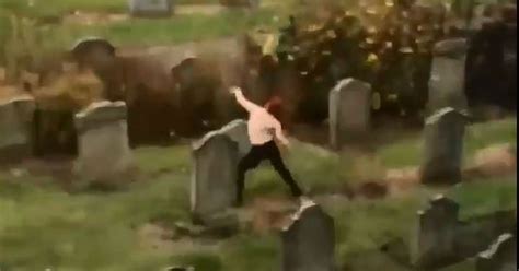 bizarre footage shows semi naked woman prancing around graves in dundee
