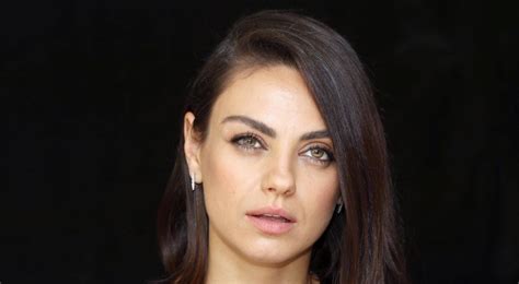 mila kunis at the spy who dumped me press conference in