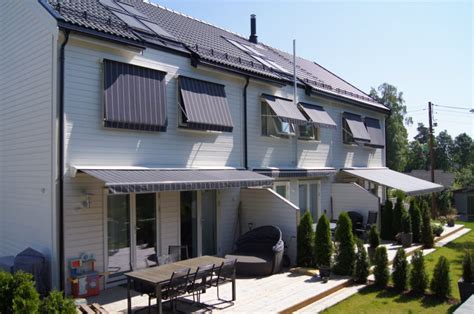 enhance  homes exterior  window awnings  housekeeper
