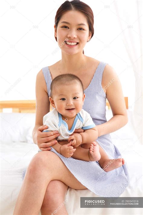 Young Asian Mom – Telegraph