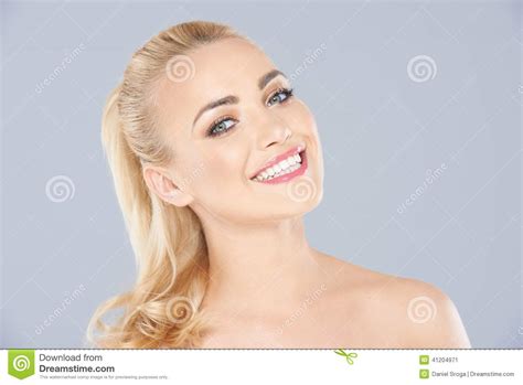 attractive blond woman with a beaming smile stock image image of