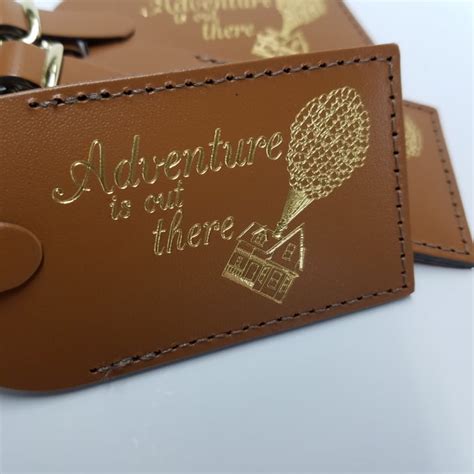 adventure is out there disney luggage tag the best disney wedding favors 2020 popsugar