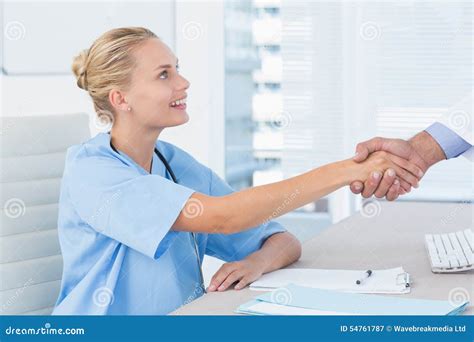 Nurse Shaking Hand Of Her Colleague Stock Image Image Of Holding
