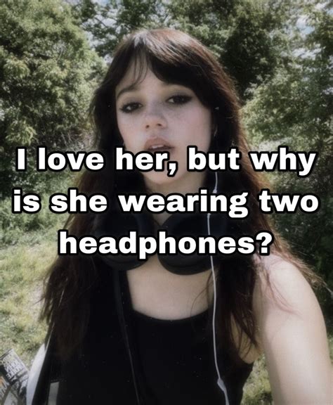 A Woman With Headphones In Her Ears And The Words I Love Her But Why