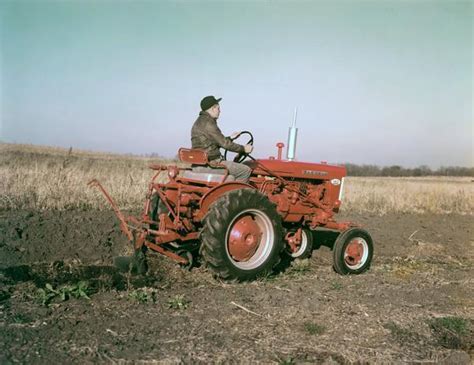 plowing   farmall  tractor photograph wisconsin historical society
