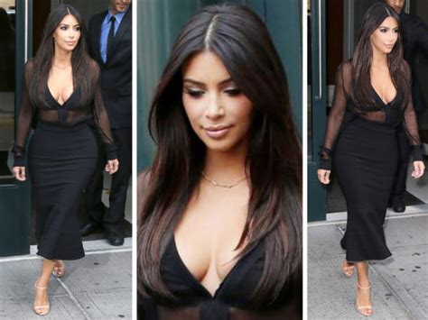 kim kardashian s cleavage peeks out of sheer top