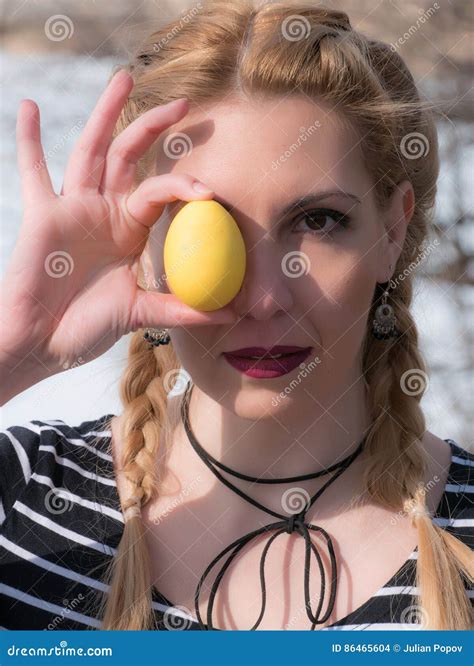 young smiling woman holding  easter egg stock photo image  girl
