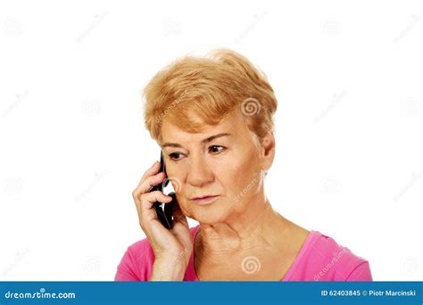 worried senior woman talking through phone stock image image of