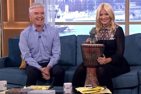 holly willoughby in shock as phillip schofield gives her