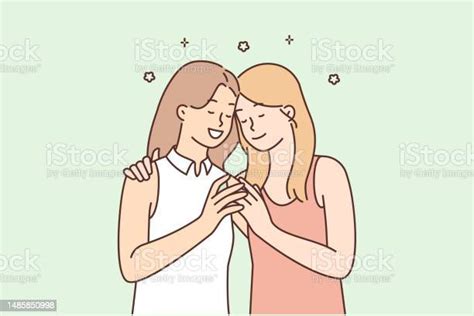 Loving Lesbian Couple Of Two Women Gently Hugging And Enjoying Romantic